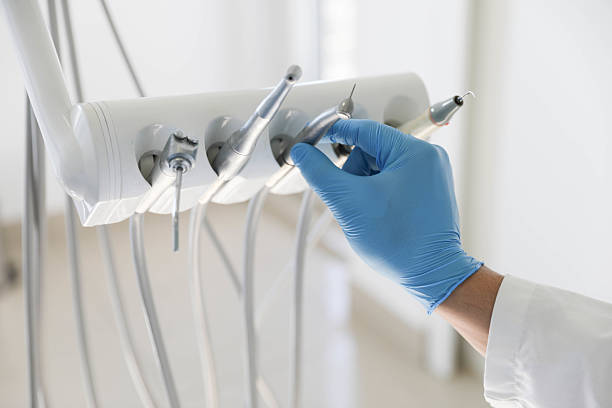 Professional Root Canal Treatment technician working in Flanders, NY